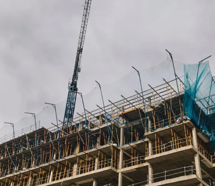 San Mateo Scaffolding Rental scaffolding and safety netting on concrete building under construction