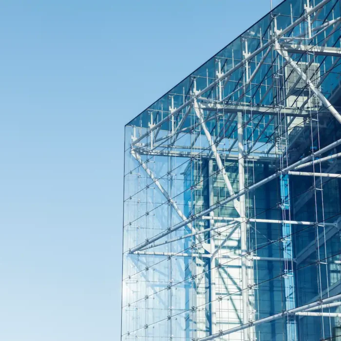San Mateo Scaffolding Rental glass building structure with steel framework and support systems